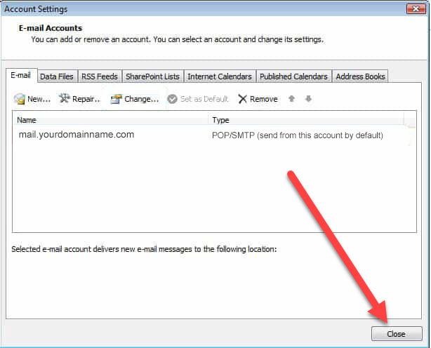 Screenshot of the Account Settings window in an email client. It lists an email account, "mail.yourdomainname.com," set as default and using POP/SMTP. A red arrow points to the "Close" button at the bottom right corner, ensuring even those focusing on web design in Horsham can easily navigate.