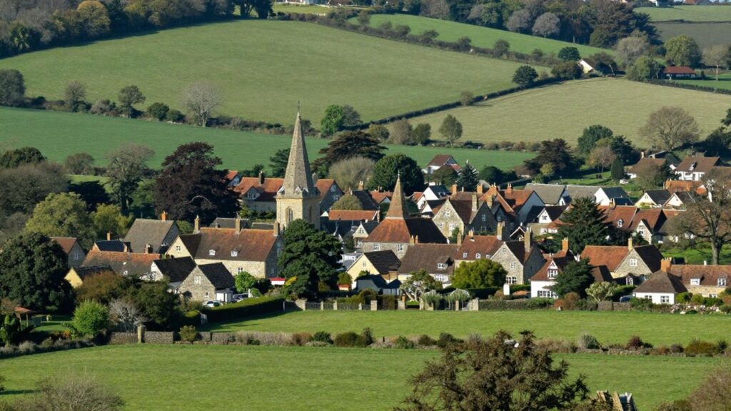 Rolling hills and villages of historic Sussex, UK. Where is Sussex UK